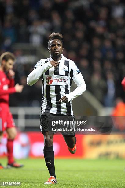 Gael Bigirimana celebrates scoring the third goal during the Barclays Premier League match between Newcastle United and Wigan Athletic at St James'...