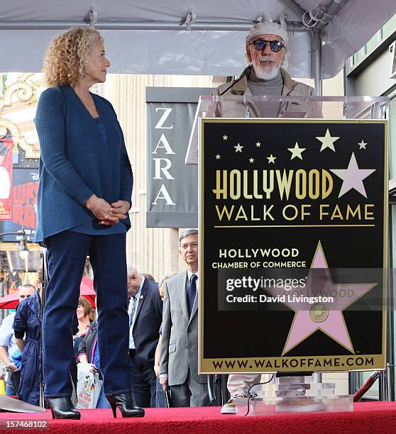 Recording artist Carole King and record producer Lou Adler attend King being honored with a Star on the Hollywood Walk of Fame on December 3, 2012 in...