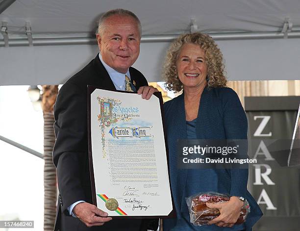 City Councilmember Tom LaBonge and recording artist Carole King attend King being honored with a Star on the Hollywood Walk of Fame on December 3,...