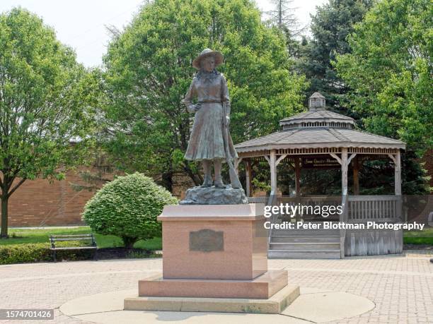 annie oakley statue and memorial in downtown greenville ohio - usa - annie oakley stock pictures, royalty-free photos & images