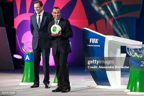 Cafu, Brazilian soccer player and Jerome Valcke present the ball “Cafusa” during the Draw for the FIFA Confederations Cup 2013 at Anhembi Convention...