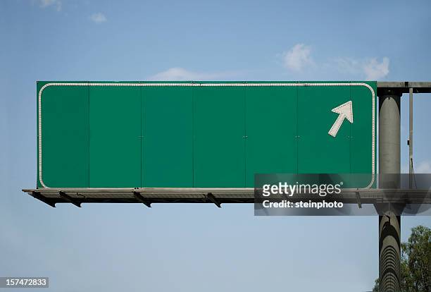 ブランク高速道路標識矢印付き - exit sign ストックフォトと画像