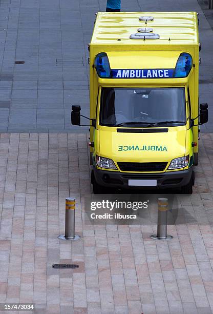 ambulance in the street - ambulance stock pictures, royalty-free photos & images