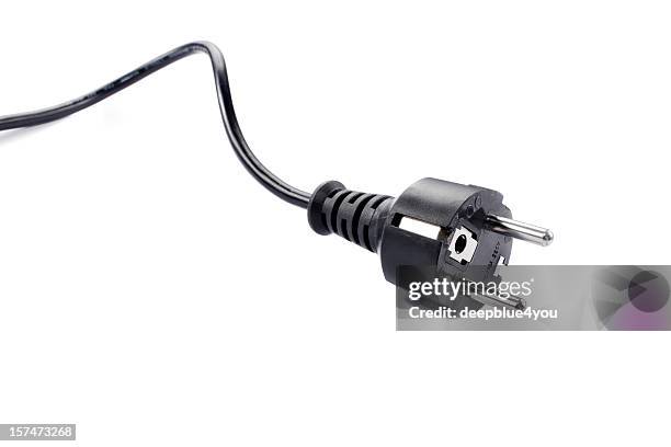 black electric cable isolated on white background - plugging in stockfoto's en -beelden