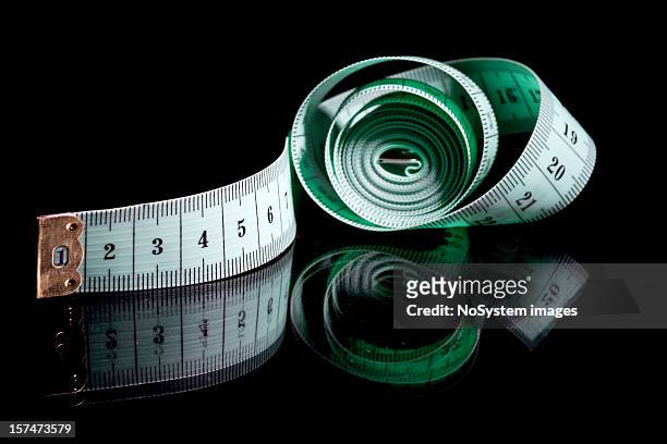 verde cinta métrica - metro unidad de medida fotografías e imágenes de stock