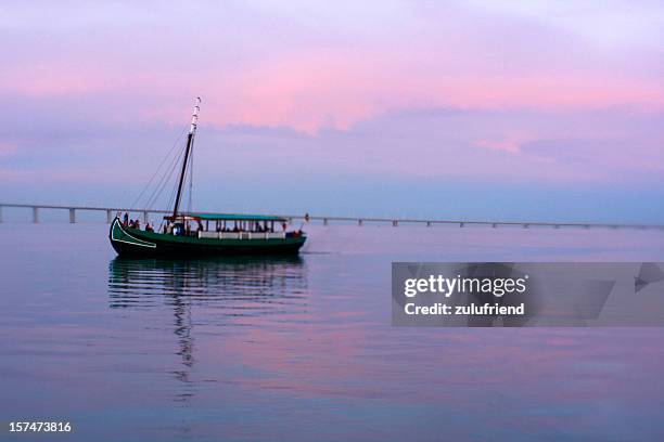 river boat - vasco da gama bridge stock pictures, royalty-free photos & images