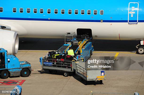 airline industry - transporting luggages - asphalt roller stock pictures, royalty-free photos & images