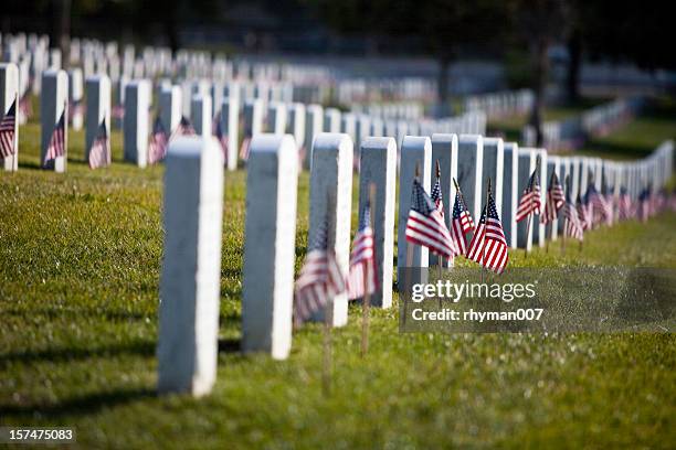 memorial day at the cemetery - memorial day stock pictures, royalty-free photos & images