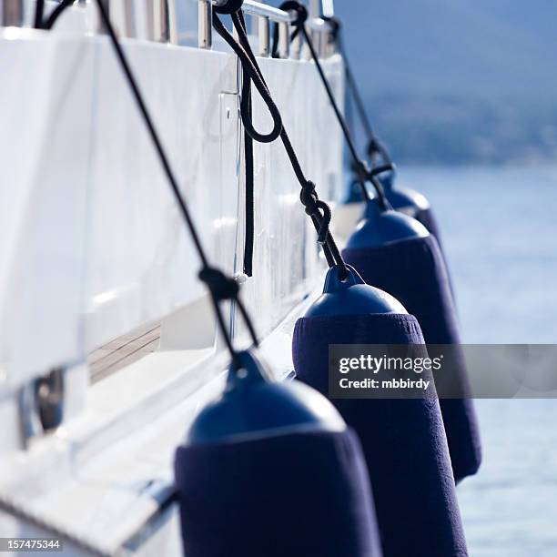 modern yacht fenders - watervaartuig stockfoto's en -beelden