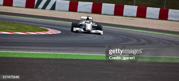 open-wheel racecar - race car curve stock pictures, royalty-free photos & images