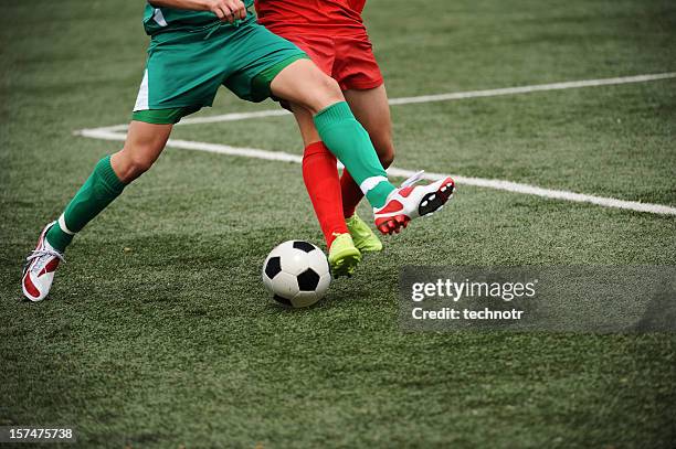 soccer duel - soccer close up stockfoto's en -beelden