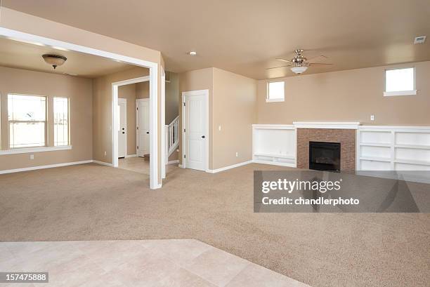 empty modern living room - beige carpet stock pictures, royalty-free photos & images