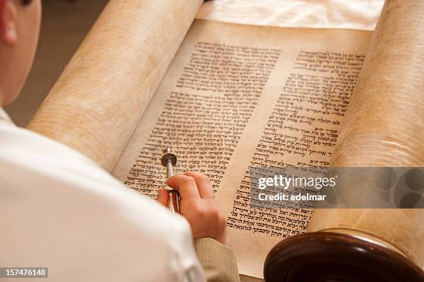 person reading the historic words of the torah - jewish celebration stock pictures, royalty-free photos & images