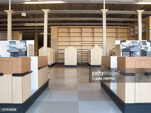 an empty retail store with checkered floors - abandoned stock pictures, royalty-free photos & images