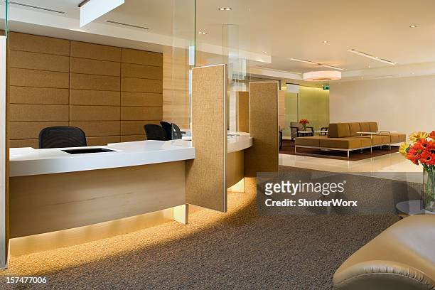 waiting area inside a luxurious building - bank counters stock pictures, royalty-free photos & images