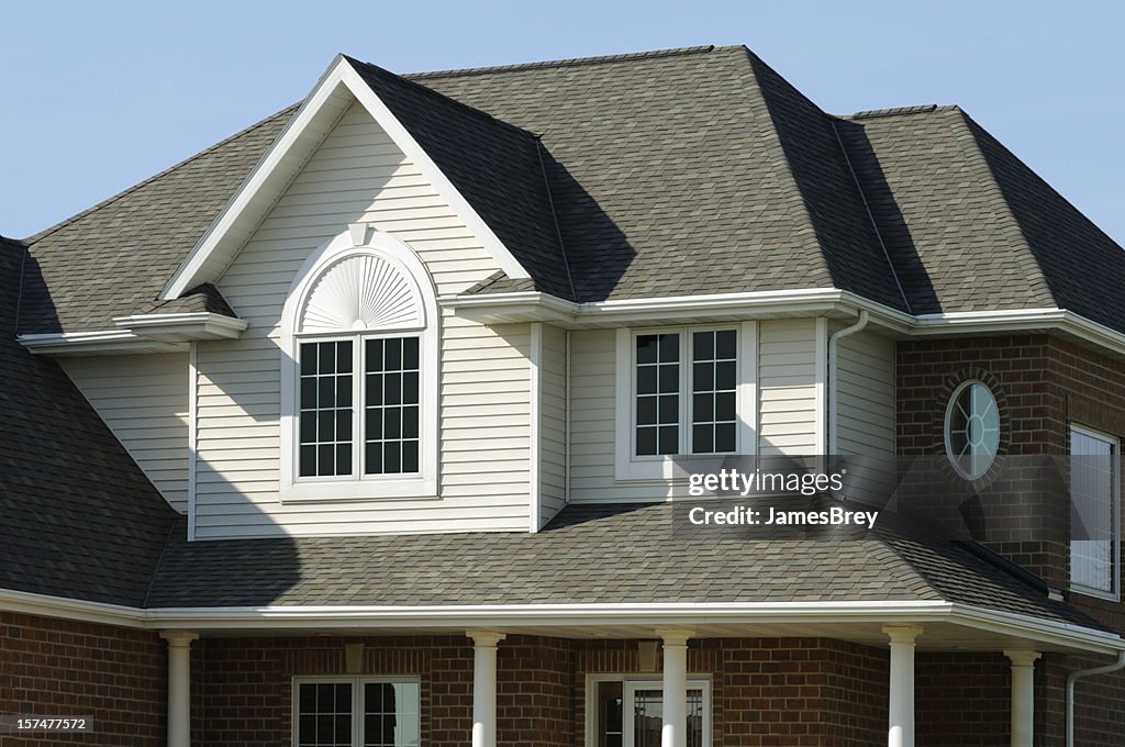 Residence, Home With Vinyl Siding, Brick, Gabled Architectural Design