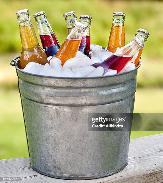 bucket o pop bottles - metal bucket stock pictures, royalty-free photos & images