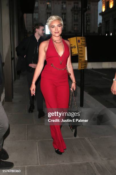 Florence Pugh seen attending the launch of Lotus flagship showroom at 73 Piccadilly on July 27, 2023 in London, England.