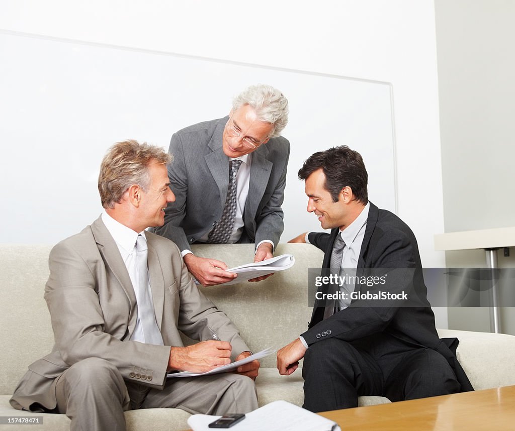 Business colleagues discussing in meeting