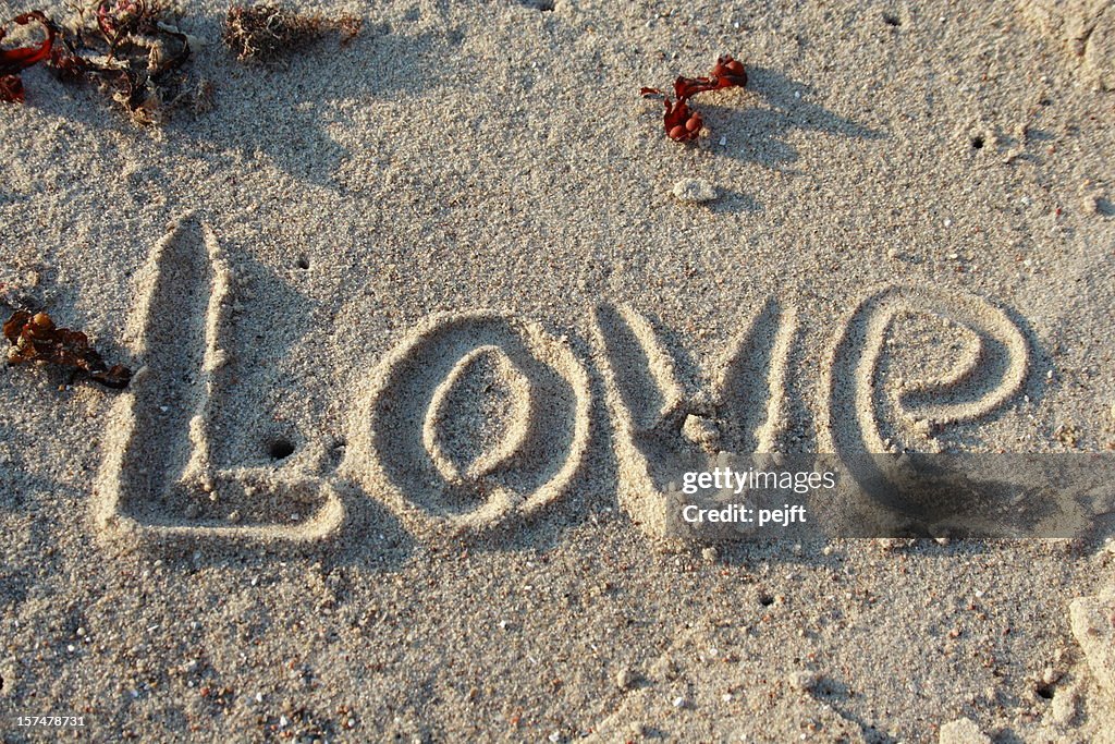 Love in sand - word of emotion