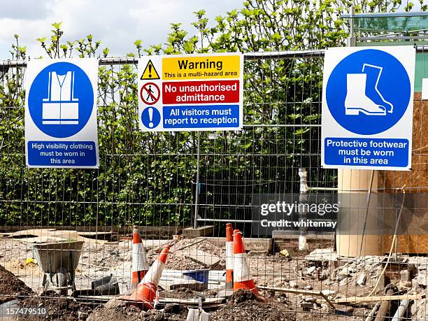 construction site warning signs - building fence bildbanksfoton och bilder