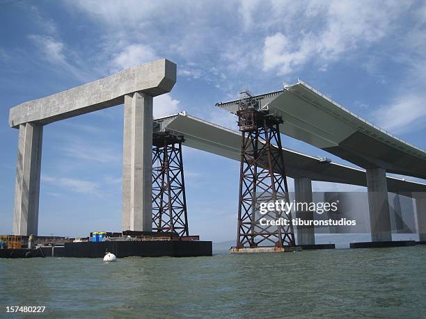 bay bridge in progress san francisco bay area - earthquake bridge stock pictures, royalty-free photos & images