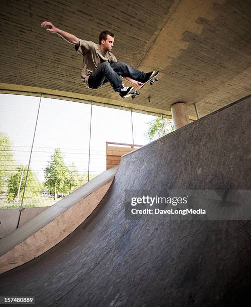 skateboarder at skate park - halfpipe stockfoto's en -beelden