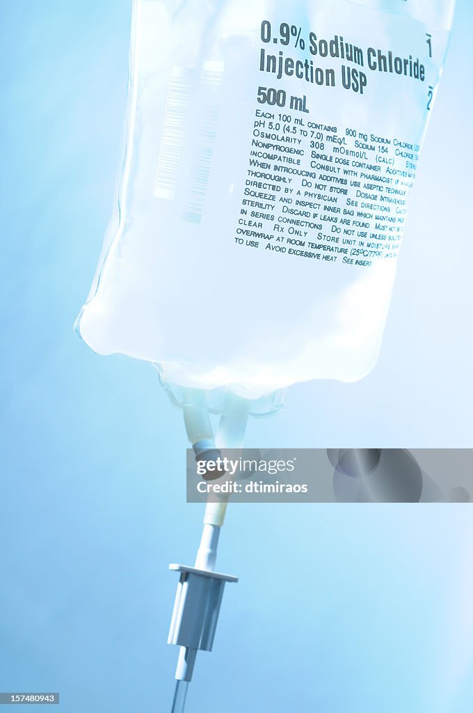 Intravenous IV bag bolus drip with sodium chloride