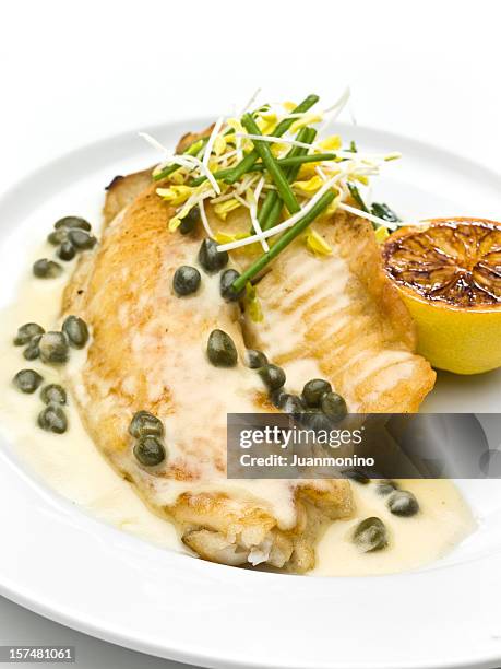 saute fillet of tilapia with capers sauce - tilapia stock pictures, royalty-free photos & images