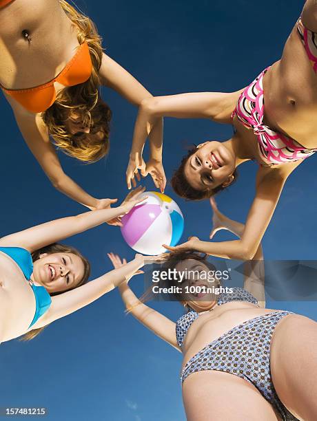 beach volleyball - girls beach volleyball stock pictures, royalty-free photos & images