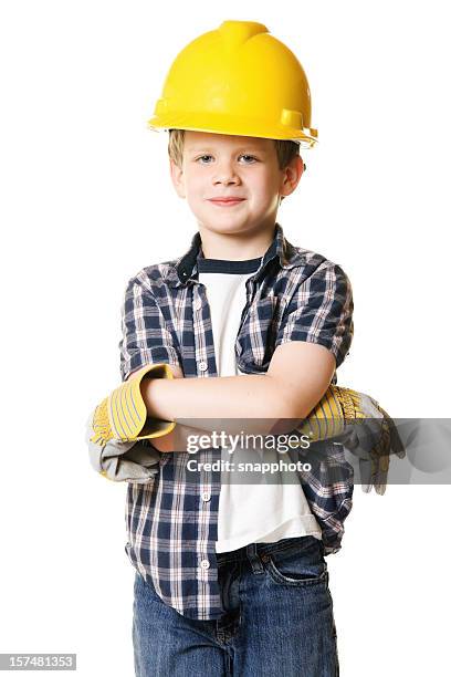 enfant garçon portant chapeau dur costume de construction - boy in hard hat photos et images de collection