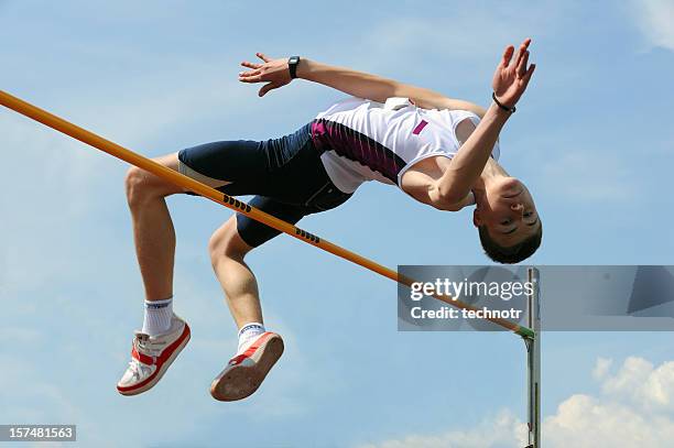 high jump athlete - high jump stock pictures, royalty-free photos & images