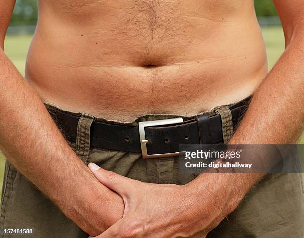 nahaufnahme männlich bauch - male stomach stock-fotos und bilder