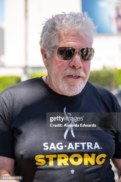 Actor Ron Perlman joins members and supporters of SAG-AFTRA and WGA on the picket line at Fox Studios on July 27, 2023 in Los Angeles, California....