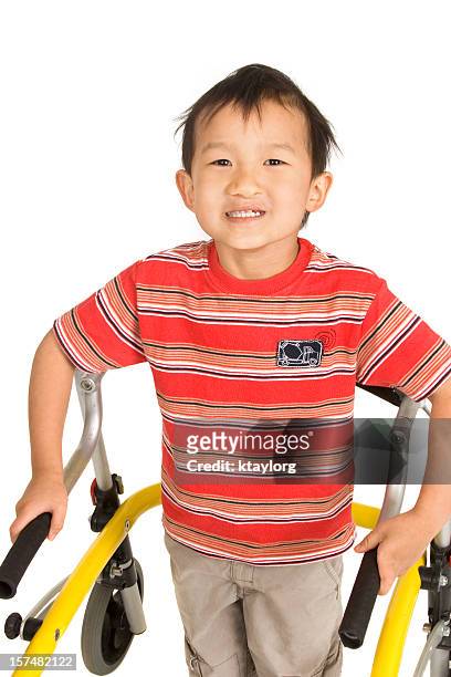little boy using walker - cleft palate stock pictures, royalty-free photos & images