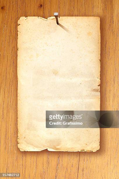brown blank wanted poster fixed with nail on wooden background - old parchment, background, burnt stock pictures, royalty-free photos & images