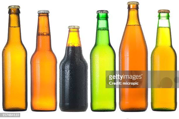 beer bottles - drink bottle stock pictures, royalty-free photos & images