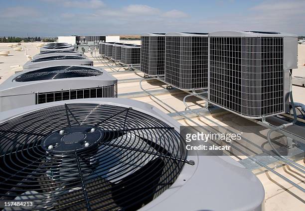 many air conditioning units outside - rooftop hvac stock pictures, royalty-free photos & images