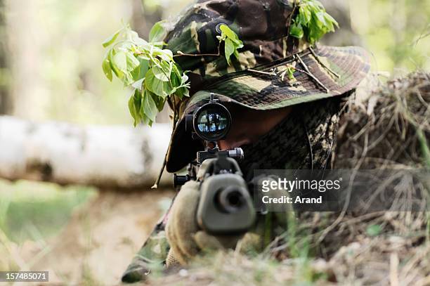 sniper - british culture stock pictures, royalty-free photos & images
