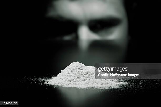 young man cocaine addicted - drugs stockfoto's en -beelden