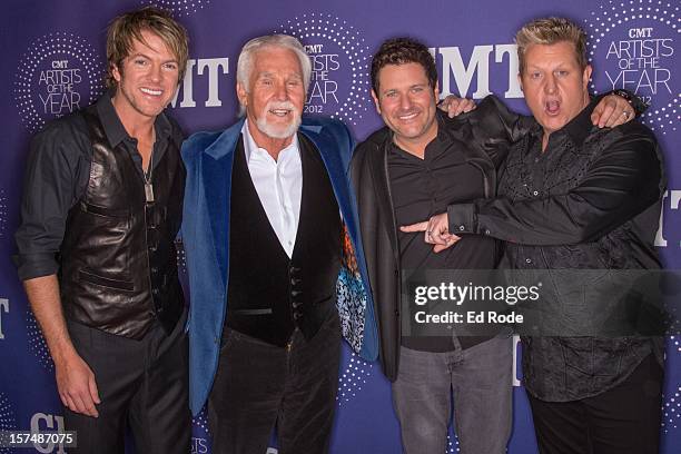 Joe Don Rooney, Kenny Rogers, Jay DeMarcus and Gary Levox attend the CMT Artist of the Year Awards at The Factory At Franklin on December 3, 2012 in...