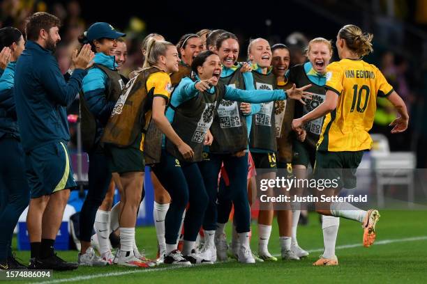 Emily Van-Egmond of Australia celebrates with Sam Kerr and substitute players after scoring her team's first goal during the FIFA Women's World Cup...