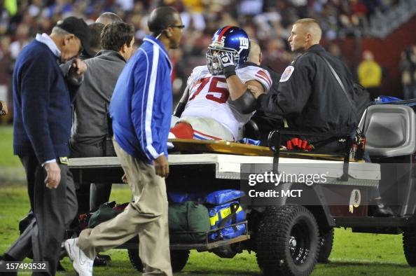 Sean Locklear New York Giants tackle Sean Locklear gets carted off the field after ...