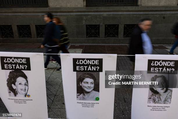 Pictures of women who disappeared and were politically executed during Augusto Pinochet's dictatorship hang in a memorial installed by the Chilean...