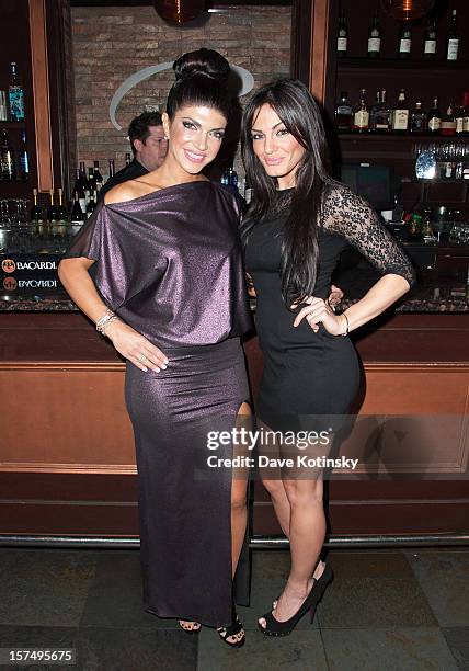 Teresa Giudice and Priscilla DiStasio attend the Posche Fashion show at The Bottagra on December 3, 2012 in Hawthorne, New Jersey.