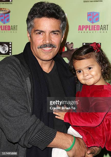 Actor Esai Morales and daughter Mariana Oliveira Morales attend the "Delhi Safari" Los Angeles premiere at Pacific Theatre at The Grove on December...