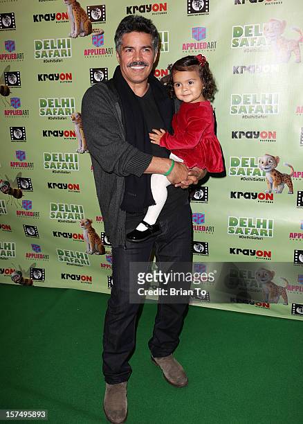 Actor Esai Morales and daughter Mariana Oliveira Morales attend the "Delhi Safari" Los Angeles premiere at Pacific Theatre at The Grove on December...