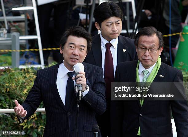 Japan Restoration Party deputy leader Osaka Mayor Toru Hashimoto speaks to voters during his official election party campaign for the upcoming lower...