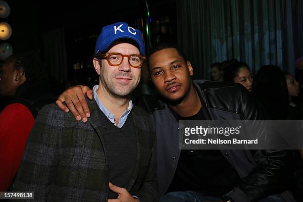 Jason Sudeikis and Carmelo Anthony attend the Dare To Fly AJXX8 event at PH-D Rooftop Lounge at Dream Downtown on December 3, 2012 in New York City.
