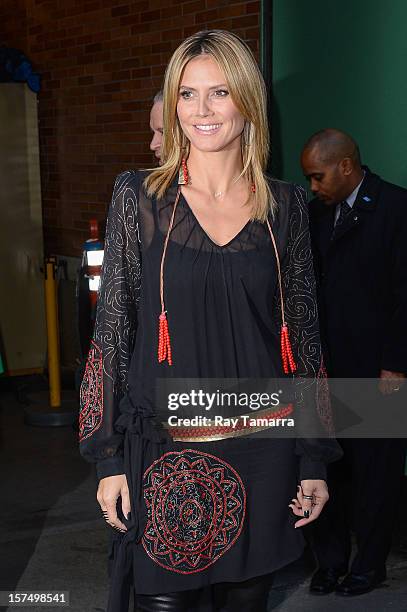 Personality Heidi Klum leaves the "Good Morning America" taping at the ABC Times Square Studios on December 3, 2012 in New York City.